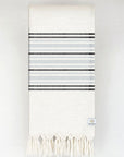 Folded grey stripes on a cream colour plain colour.