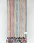 Folded multi-colour scarf cotton in the beige base colour.