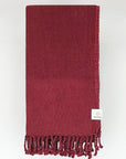 Folded 100% cotton scarf in plain cherry colour.