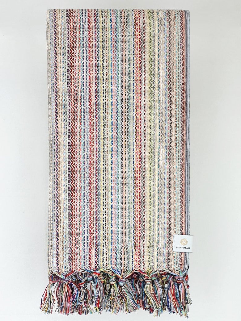 Folded multi-colour scarf cotton in the beige base colour.