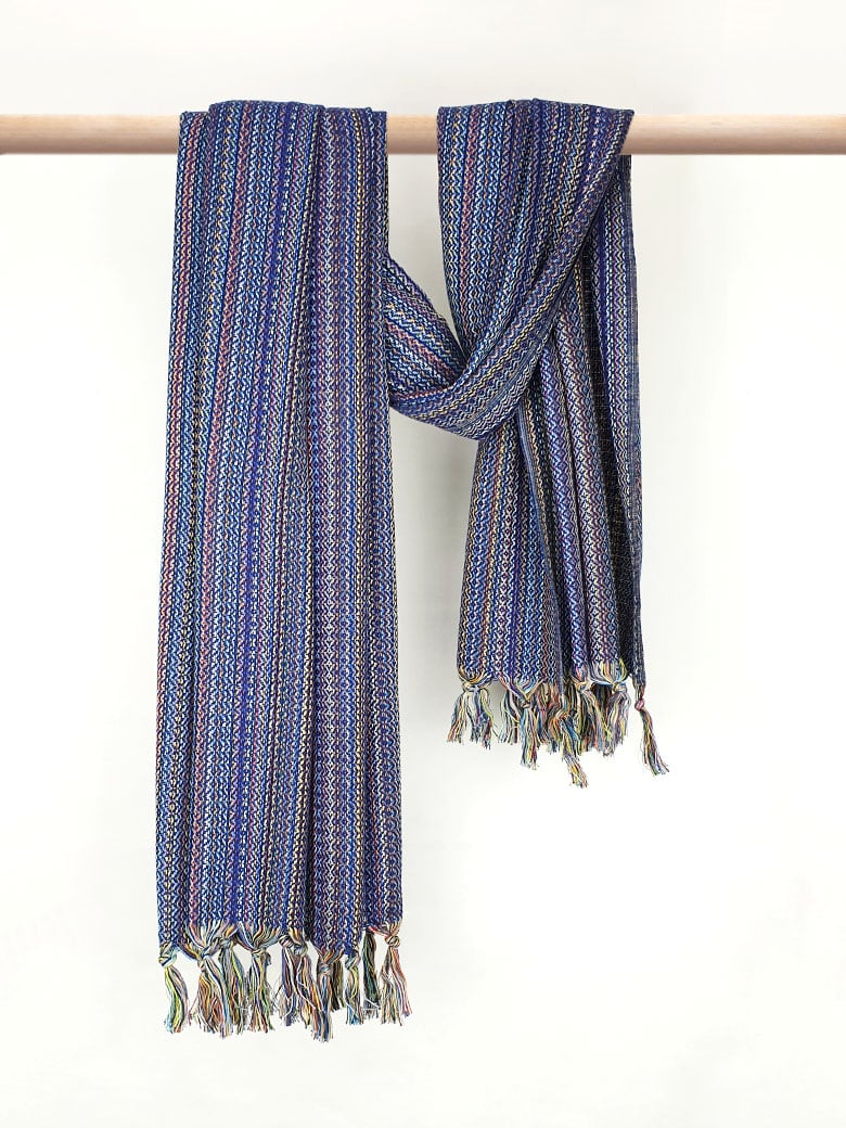 Multi-colour scarf cotton in navy base colour with knotted fringe and hand-twisted style on the stick.