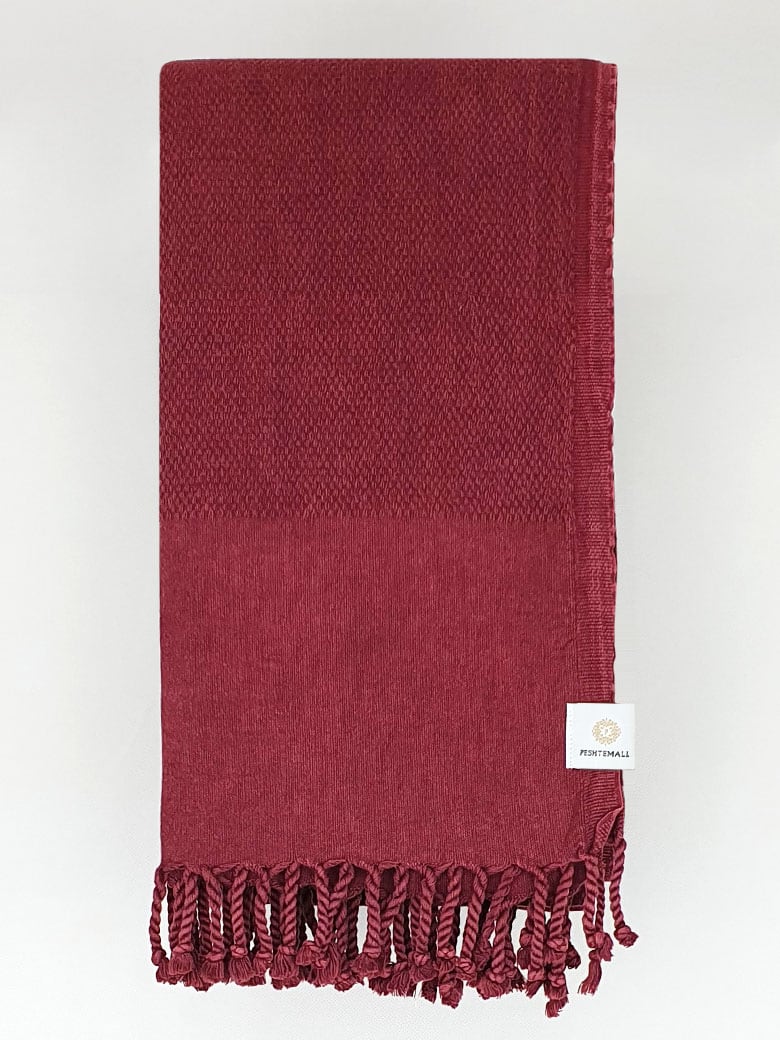 Folded 100% cotton scarf in plain cherry colour.