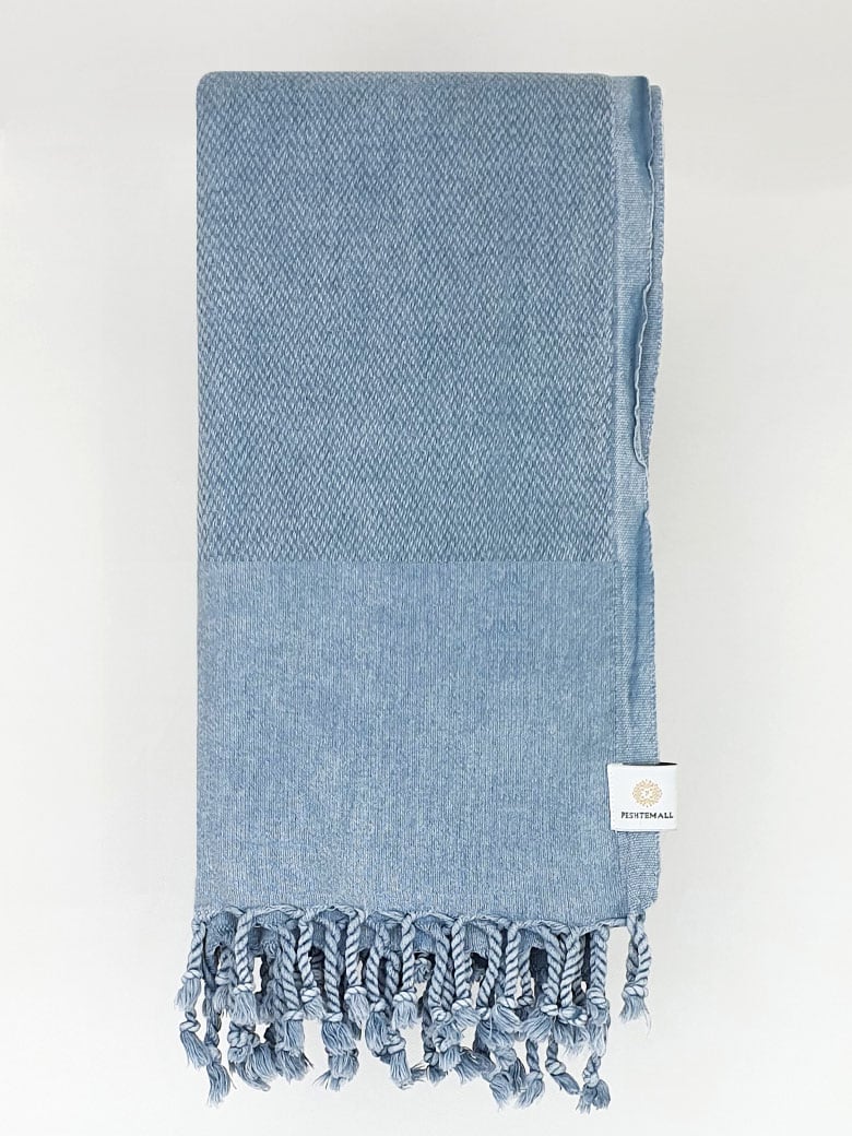 Folded 100% cotton scarf in plain grey colour.