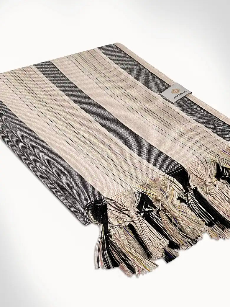 Side image of folded vertical stripes hammam towel with thin and thick colourful.