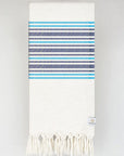 Folded cotton & linen towel with navy stripes colour.