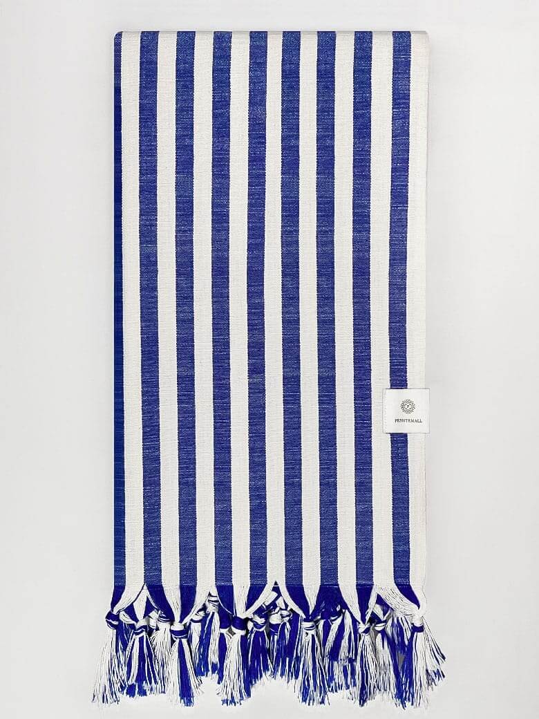 Folded large towel with blue thick stripes colour.