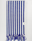 Folded large towel with blue thick stripes colour.